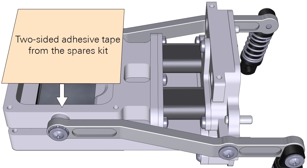 Attach a piece of adhesive tape to the top of the chamber.