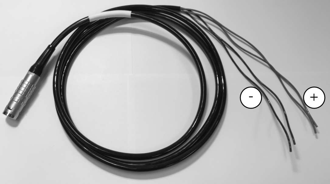 The auxiliary power cable has bare leads that connect to a power supply.