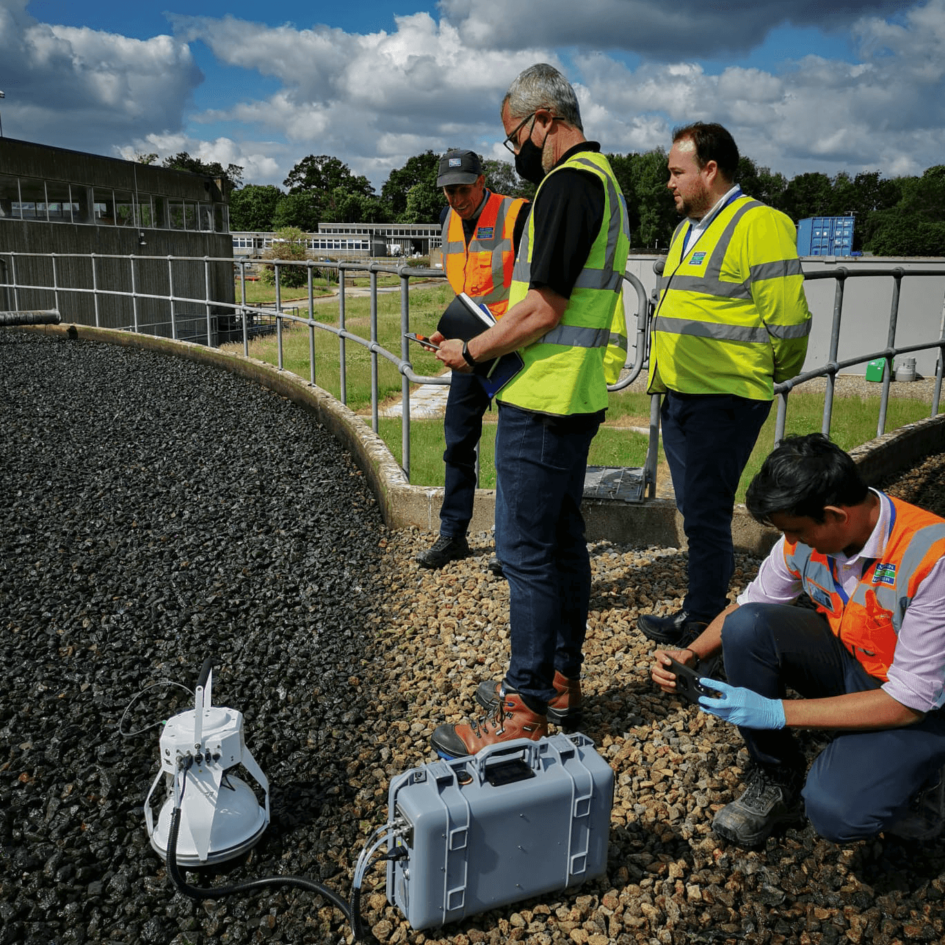 Researchers observing the LI-7820 and Smart Chamber